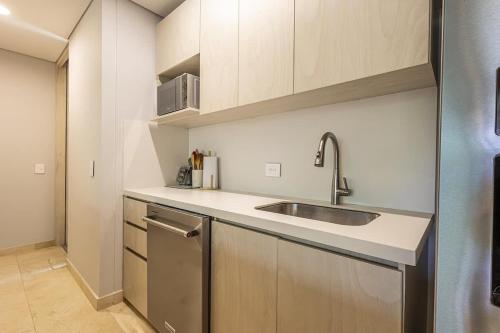 a kitchen with a sink and a counter top at 3 Bedroom apt with jacuzzi in Baru in Cartagena de Indias