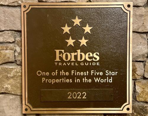 a sign for the first five star properties in the world at 5 Star Hotel - Exclusive Private Residence in Telluride