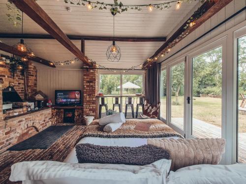 a bedroom with a large bed in a house at The Old Forge in Bishop Wilton