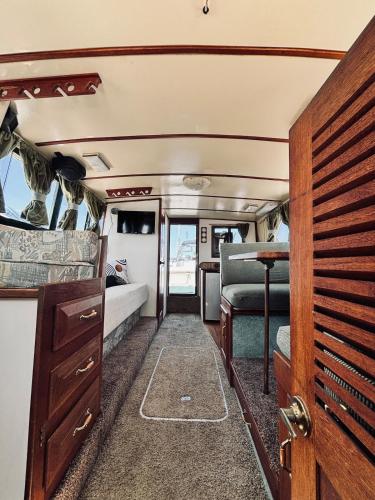 a van with a bed and a desk in it at Buffalo's River Den II - Easy Rider in Buffalo