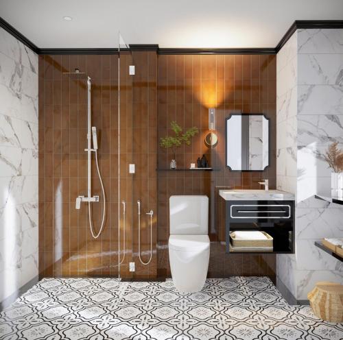 a bathroom with a shower with a toilet and a sink at Boutique KAS Luxury Hotel in Ho Chi Minh City