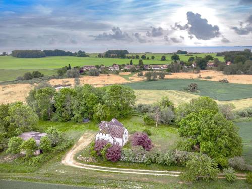 an aerial view of a house in a field at Gutshaus Glowitz in Glowitz