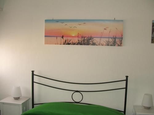 A bed or beds in a room at B&B La Cubanina