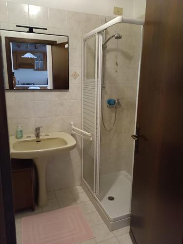 a bathroom with a shower and a sink at Corte Maria in Vicenza