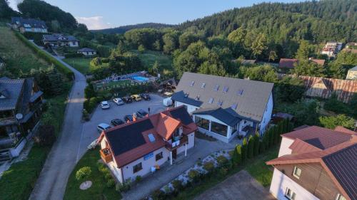 an aerial view of a small village with a house at Willa Karla in Krynica Zdrój