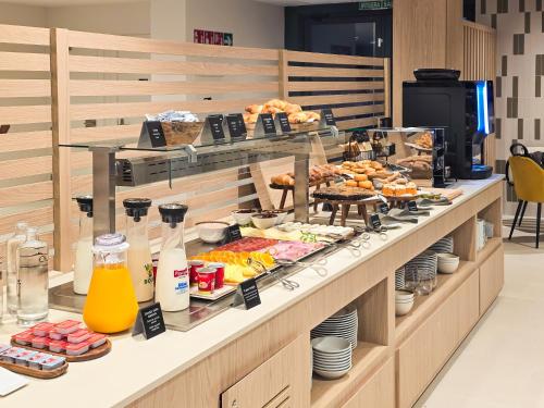 a buffet with a lot of food on display at DWO San Sebastián in San Sebastián