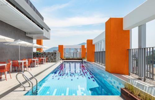 a swimming pool on the roof of a building at Hyatt Place Busan Yeonsan in Busan