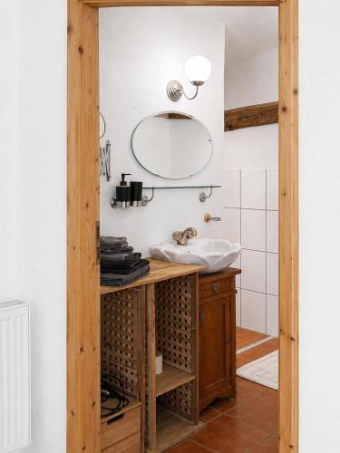 a bathroom with a sink and a mirror at s'Morent in Zöblen
