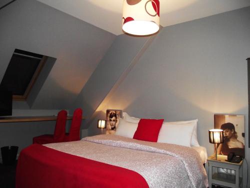 Кровать или кровати в номере Hotel Mondial
