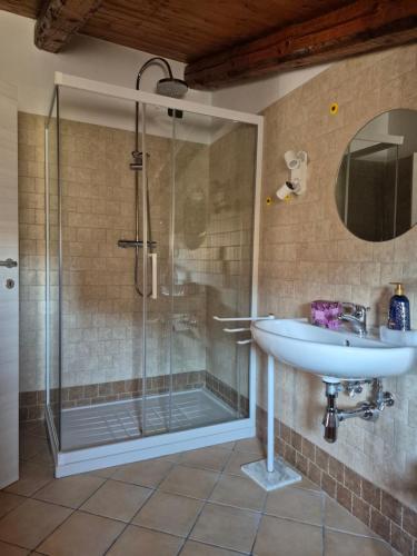 a bathroom with a shower and a sink at Dimora Suriano in Altamura