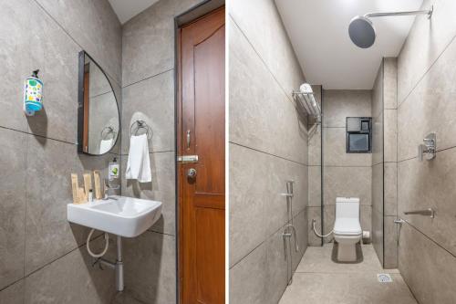 a bathroom with a sink and a toilet at Treebo Planet Mount Near US Consulate Anna Salai in Chennai