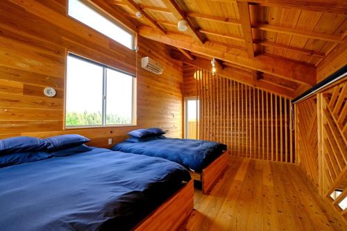 Llit o llits en una habitació de Blu Pointe & Retreat