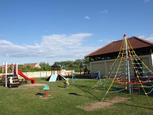 a park with a playground with a play structure at Apartmány Fojtova studna in Sedlec
