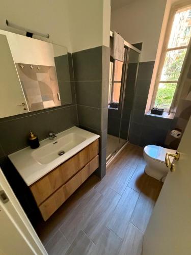 a bathroom with a sink and a toilet at Residence Emporium in Rome