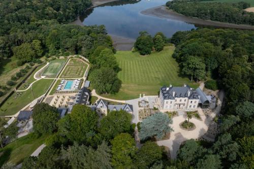 an aerial view of an estate with a large house at Domaine de Locguénolé & Spa - Relais & Chateaux in Kervignac