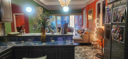 a living room with a counter top and a living room at Hilltop Villa Chez Coco in Rodney Bay Village