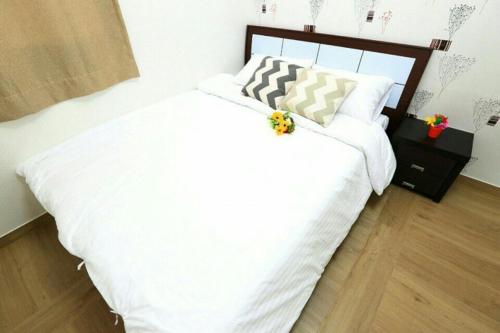 Postel nebo postele na pokoji v ubytování Jeju Special Pension
