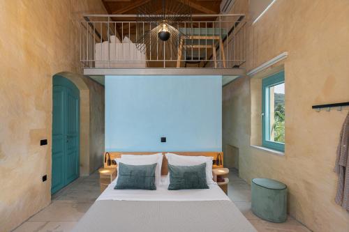 a bedroom with a large bed in a room at Anassa House with Rooftop Jacuzzi in Vamos