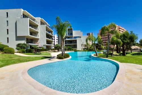 Apartamento Oasis com Piscina Perto da Praia