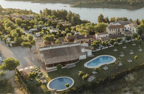 an aerial view of a resort with two swimming pools at Camping Kikopark Rural in Villargordo del Cabriel