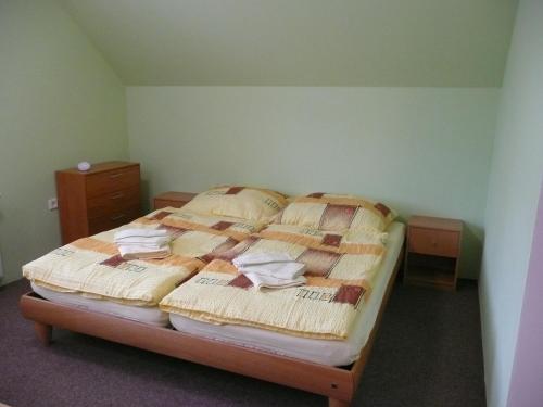 Postel nebo postele na pokoji v ubytování Penzion Lipina