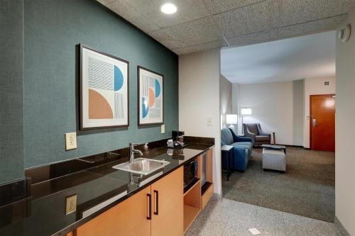 a bathroom with a sink and a waiting room at Drury Inn & Suites Montgomery in Montgomery