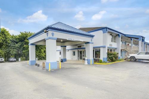 a parking lot in front of a building at Ole South Inn Jackson I 40 TN in Denmark