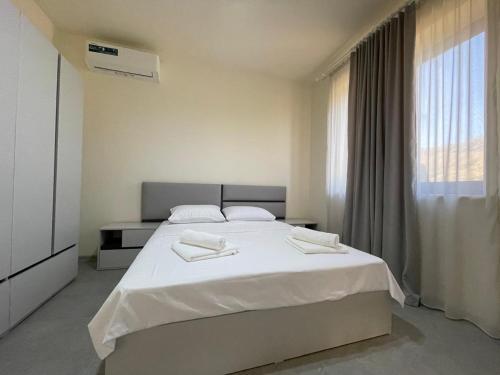 Katil atau katil-katil dalam bilik di Lizet Guest House Areni
