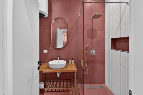a bathroom with a sink and a shower at 2115 Boutique Hotel in Durrës