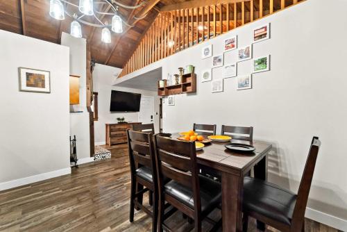 a dining room with a table and chairs at Delightful Cabin Loft Fire Pit & BBQ Julian in Julian