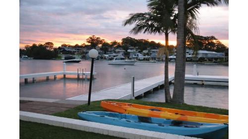 a couple of boats parked next to a marina at Balmoral Jetty Estate in Balmoral