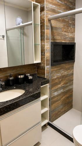 a bathroom with a sink and a shower at Luxury flat in Monte Castelo in Sairé