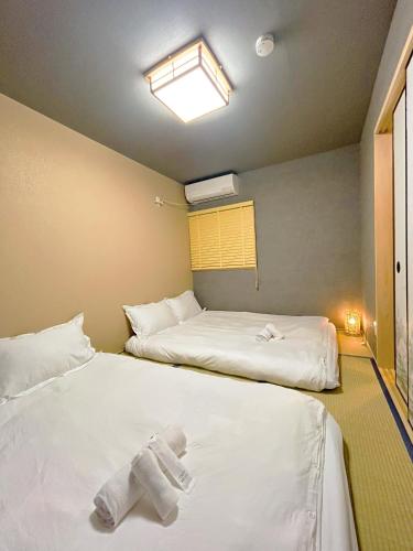 Spacious 40 Square Meter Suite with Separate Living Room and Bedroom Japanese Modern Style JR and Osaka Metro Access Near Kyocera Dome USJ