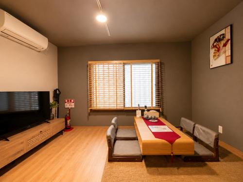 Spacious 40 Square Meter Suite with Separate Living Room and Bedroom Japanese Modern Style JR and Osaka Metro Access Near Kyocera Dome USJ