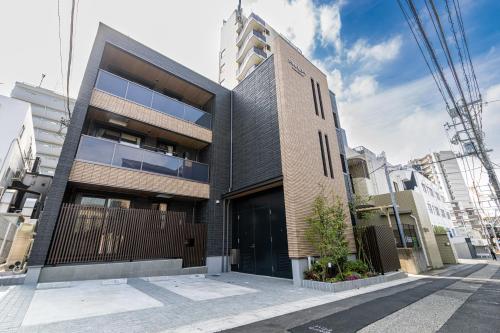 a building on a city street with at ReLA Kashiwa Eki Nishi in Kashiwa