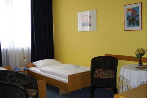 
Ein Bett oder Betten in einem Zimmer der Unterkunft Hotel Borcharding Rheine Mesum
