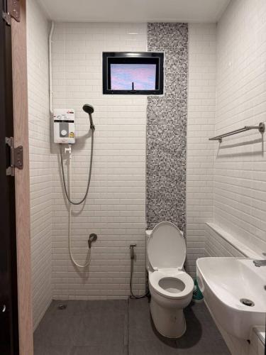 a bathroom with a shower and a toilet and a sink at C S phangan Villa in Ban Madua Wan