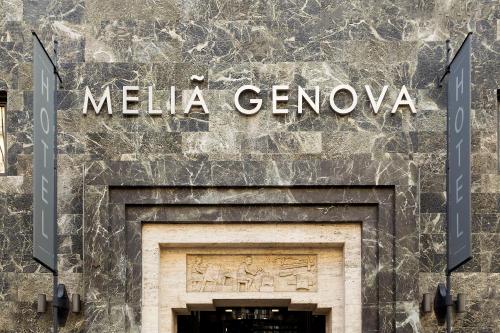 a building with a sign that reads melia genova at Meliá Genova in Genoa