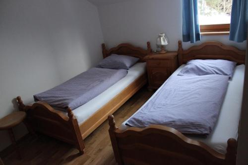 Postel nebo postele na pokoji v ubytování Haus Rathore