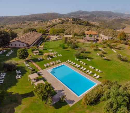 an aerial view of a large estate with a swimming pool at Hotel Tenuta di Artimino member of Meliá Collection in Artimino