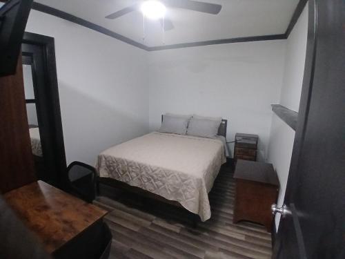 a bedroom with a bed in a room at Cozy Retreat 1 Bed and Bath in San Antonio