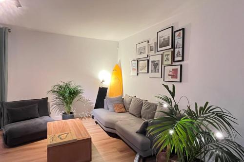 A modern apartment a terrace and a garden
