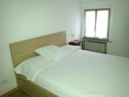 Un pat sau paturi într-o cameră la Riva San Vito 2