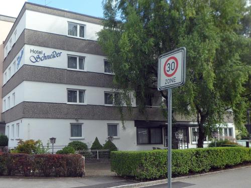 a no parking sign in front of a building at Hotel Schneider in Bad Säckingen