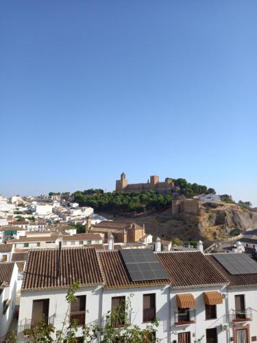 a group of houses with solar panels on their roofs at Despertar in Antequera