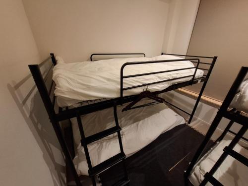two bunk beds in a room with a window at Nagoya - Hotel - Vacation STAY 01596v in Nagoya