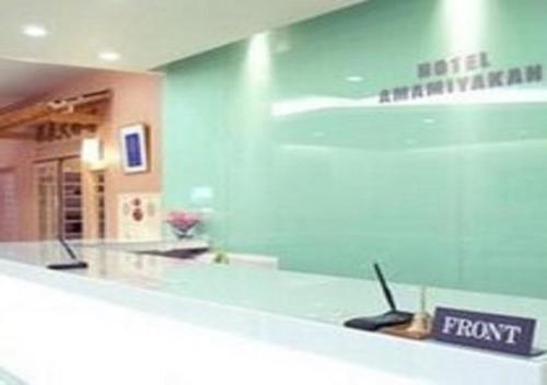 a store with a front counter with a sign on it at Hakodate - Hotel / Vacation STAY 34006 in Hakodate