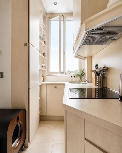 Elegant Haussmann style apartment with balcony Eiffel Tower view