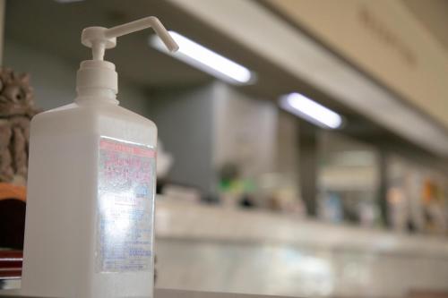 a white bottle of laundry detergent sitting on a table at Main Hotel - Vacation STAY 82545 in Miyakonojō