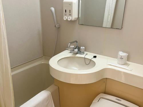 a bathroom with a sink and a toilet at Hotel Yamadaso - Vacation STAY 10193v in Nago